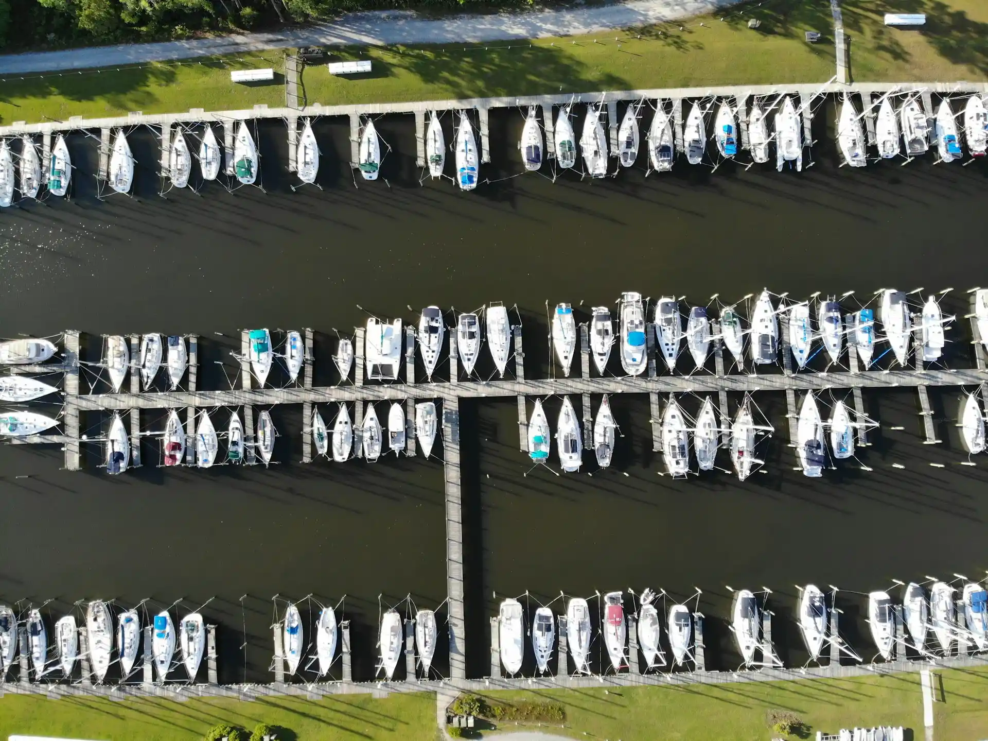 An aerial view of a large, densely packed marina filled with numerous docked boats, providing a visual context for discussing how many houseboats are on Florida Keys.